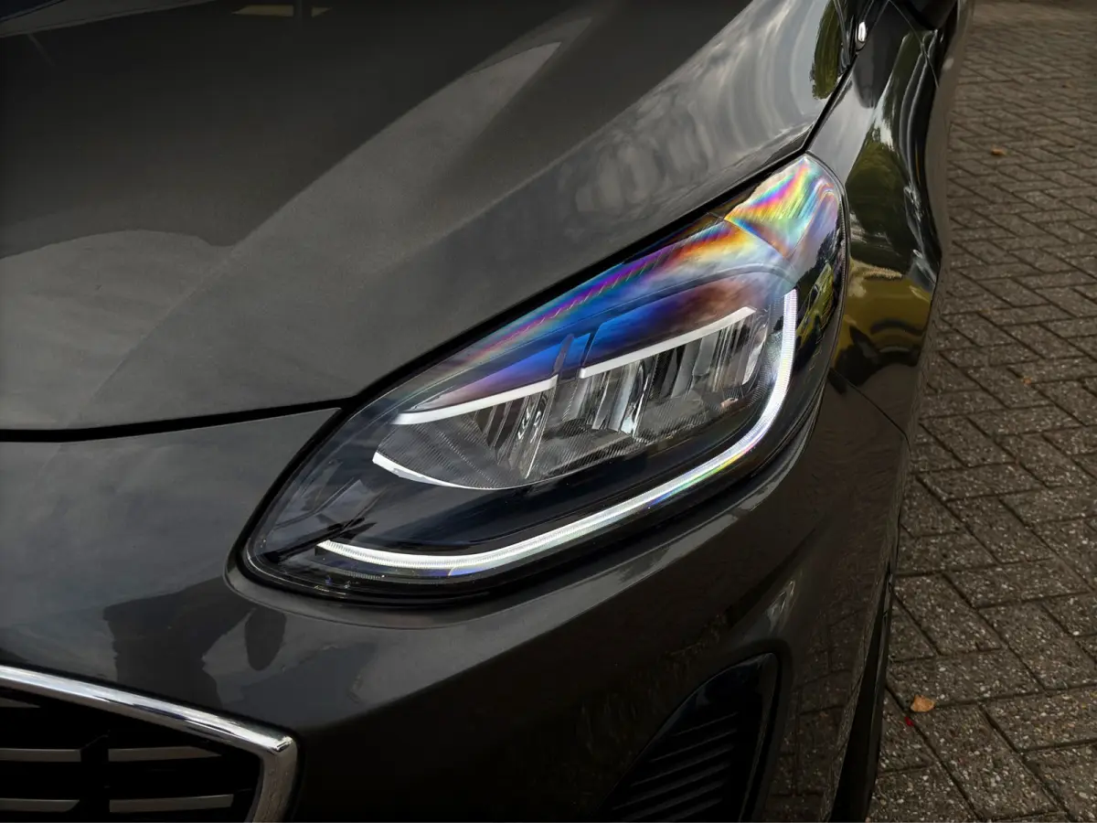 1.0 Hybrid Titanium | Winterpack | Cruise control | CarPlay | Radio |