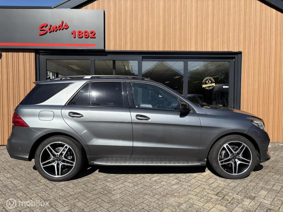 250D 4MATIC AMG Sport Edition 204Pk Grijs Kenteken | NL Auto | Schuif \ kantel dak | Elec.trekhaak | Navi | Elektrische stoelen met geheugen | Lucht-vering | Navigatie | 229dkm NAP | TOPSTAA