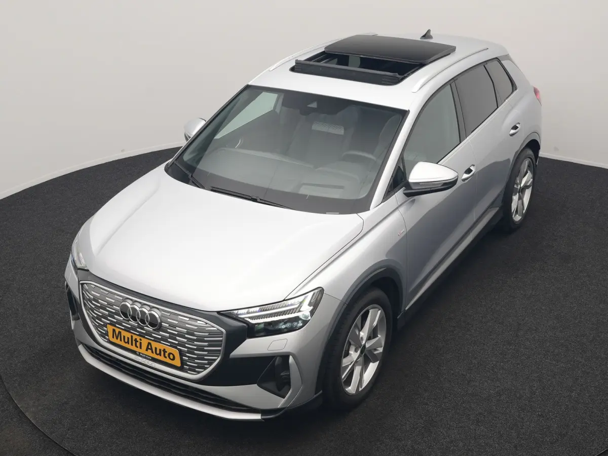 40 S Line 77 kWh 204pk Dealer O.H. | Panodak | Adaptive Cruise | Head Up | Camera | Matrix LED | Camera | Warmtepomp | Sportstoelen Memory & Verwarmd | Stuur Verwarmd | Apple Carplay | Navig