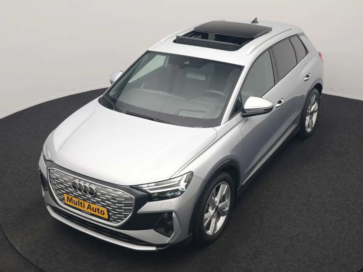 40 S Line 77 kWh 204pk Dealer O.H. | Panodak | Adaptive Cruise | Head Up | Camera | Matrix LED | Camera | Warmtepomp | Sportstoelen Memory & Verwarmd | Stuur Verwarmd | Apple Carplay | Navig