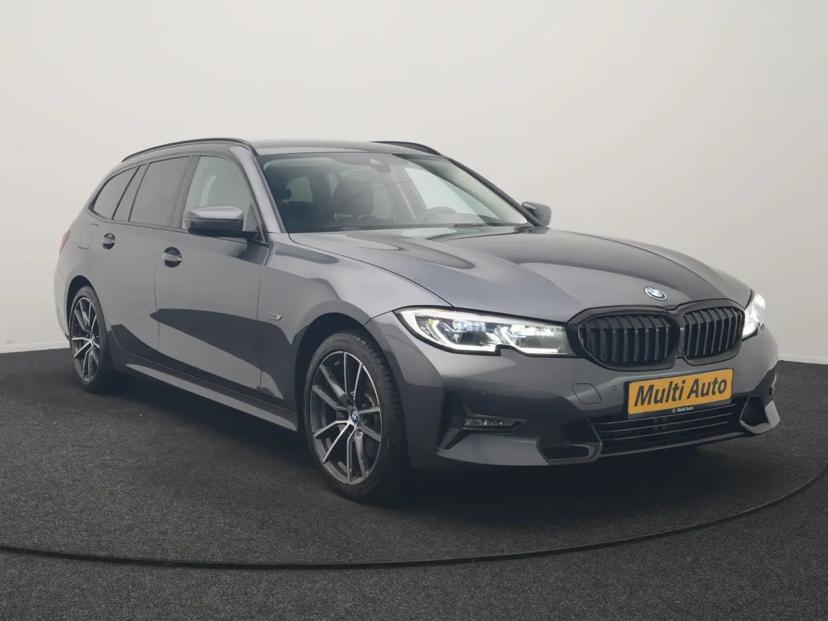 320e xDrive Sportline PHEV 204pk Dealer O.H | SOH 88,1% | Trekhaak Af Fabriek | Camera | Laser LED | Cruise Control | Lederen Sportstoelen Verwarmd | Keyless | Sfeerverlichting | Apple Carpl