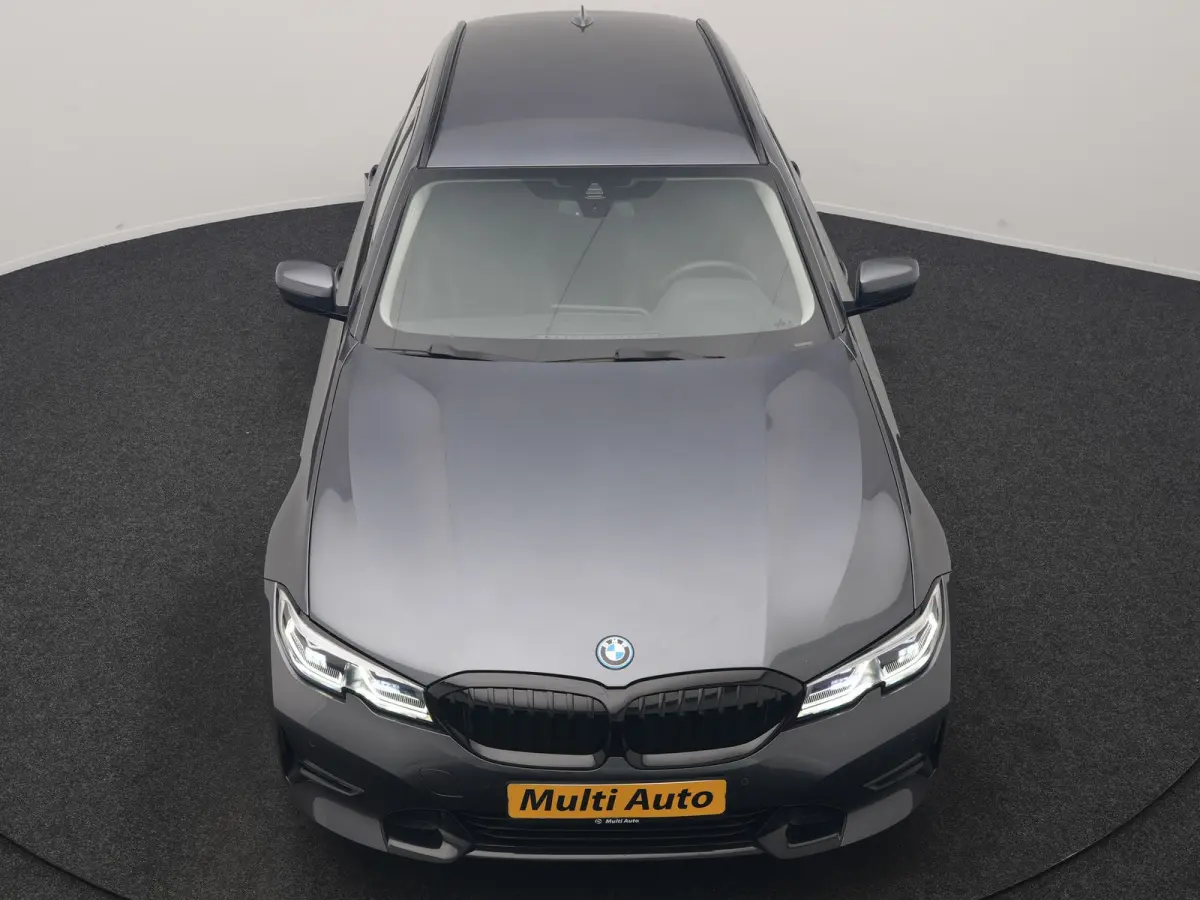 320e xDrive Sportline PHEV 204pk Dealer O.H | SOH 88,1% | Trekhaak Af Fabriek | Camera | Laser LED | Cruise Control | Lederen Sportstoelen Verwarmd | Keyless | Sfeerverlichting | Apple Carpl