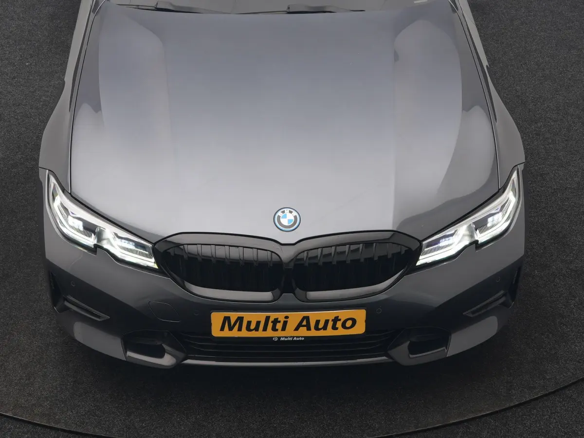 320e xDrive Sportline PHEV 204pk Dealer O.H | SOH 88,1% | Trekhaak Af Fabriek | Camera | Laser LED | Cruise Control | Lederen Sportstoelen Verwarmd | Keyless | Sfeerverlichting | Apple Carpl
