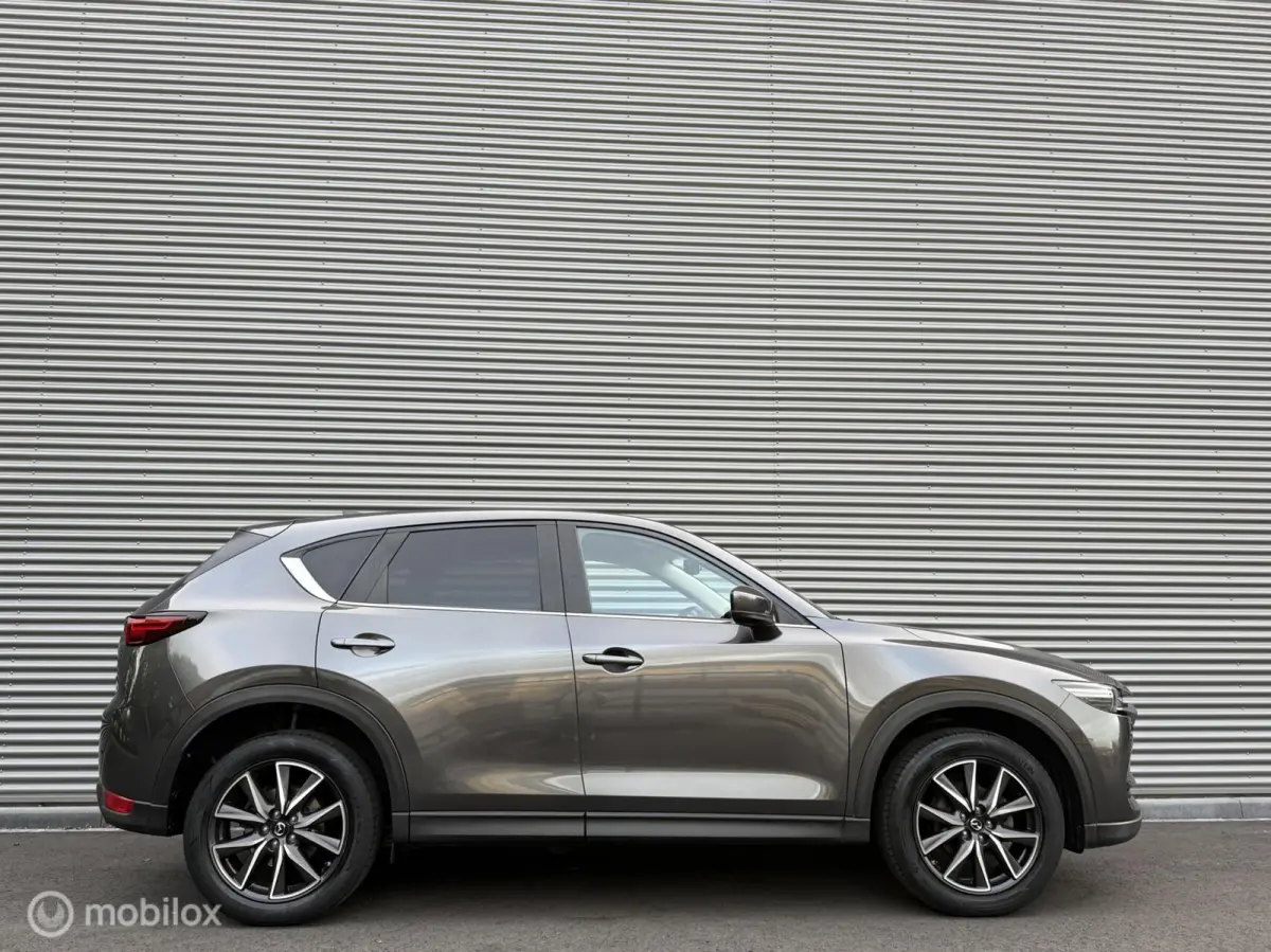 2.0 SkyActiv-G 165 TS+ | Trekhaak | HUD | Camera | Navi | Clima | Cruise | Stoelverwarming | Stuurverwarming |