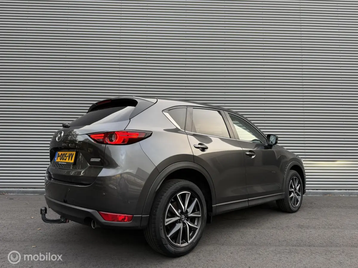 2.0 SkyActiv-G 165 TS+ | Trekhaak | HUD | Camera | Navi | Clima | Cruise | Stoelverwarming | Stuurverwarming |