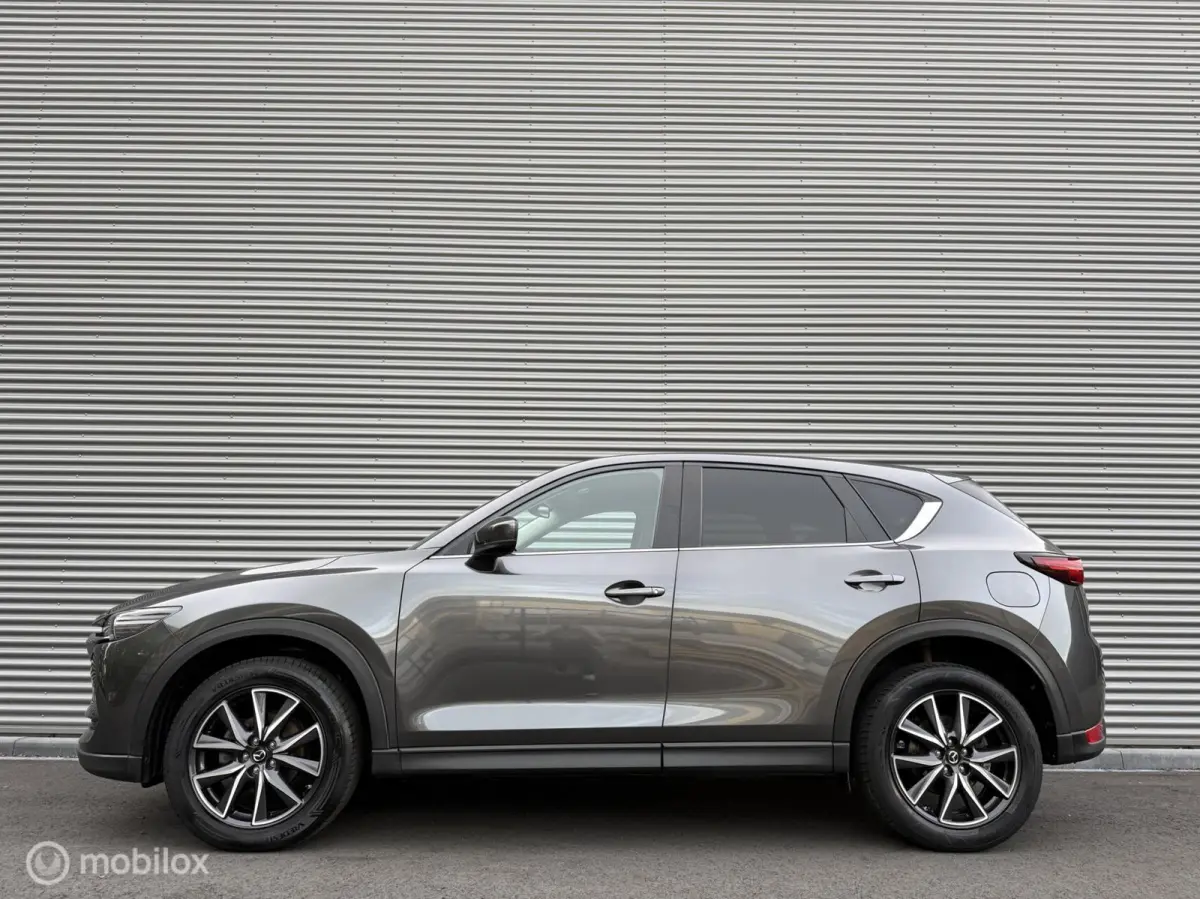 2.0 SkyActiv-G 165 TS+ | Trekhaak | HUD | Camera | Navi | Clima | Cruise | Stoelverwarming | Stuurverwarming |