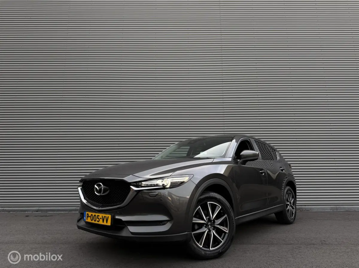 2.0 SkyActiv-G 165 TS+ | Trekhaak | HUD | Camera | Navi | Clima | Cruise | Stoelverwarming | Stuurverwarming |
