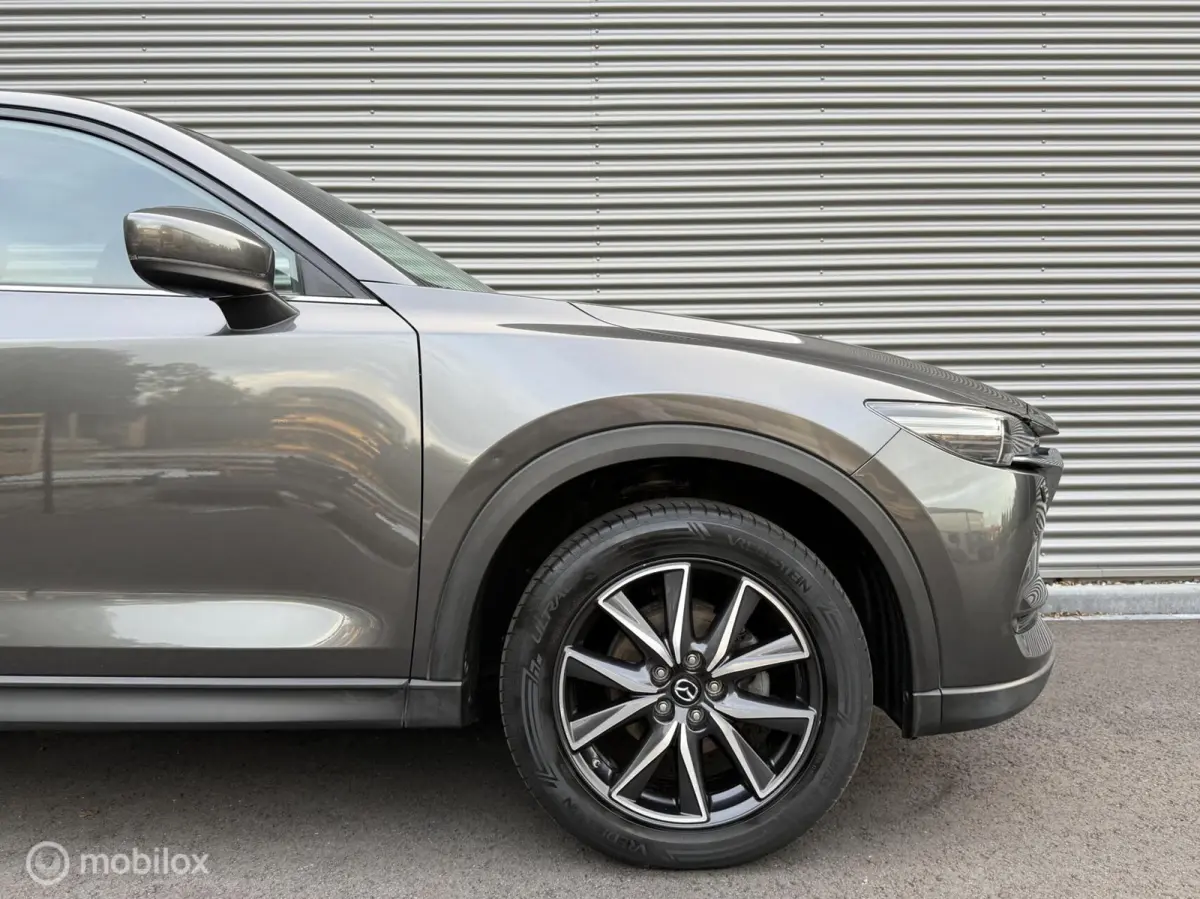 2.0 SkyActiv-G 165 TS+ | Trekhaak | HUD | Camera | Navi | Clima | Cruise | Stoelverwarming | Stuurverwarming |