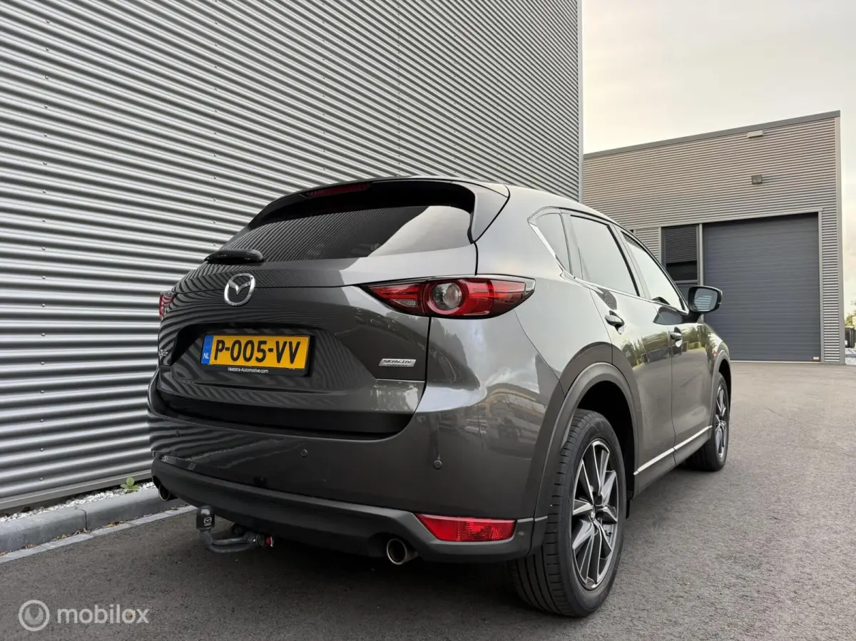 2.0 SkyActiv-G 165 TS+ | Trekhaak | HUD | Camera | Navi | Clima | Cruise | Stoelverwarming | Stuurverwarming |