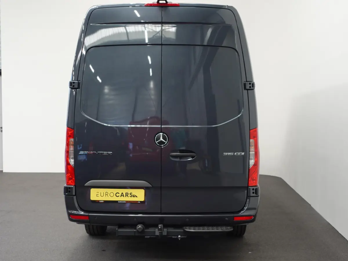 315 L3H2 Automaat Trekhaak Airco Adaptive Cruise Control Parkeersensoren Camera Leder