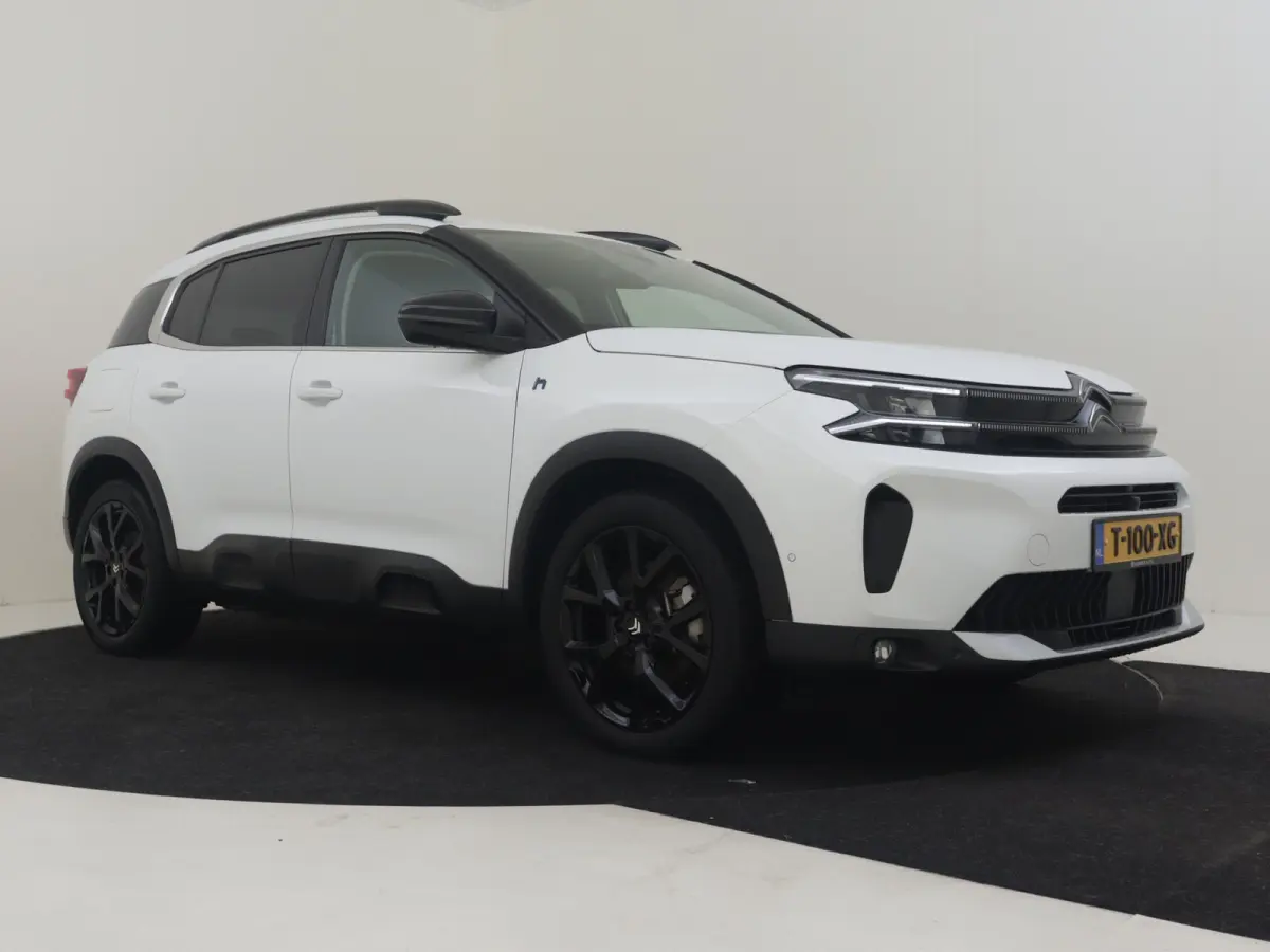 1.6 Plug-in Hybrid 180 Business Plus l Dodehoek Assist l Camera l Parkeersensoren l Navi l Stoelverwarming l Apple Car play / Android l
