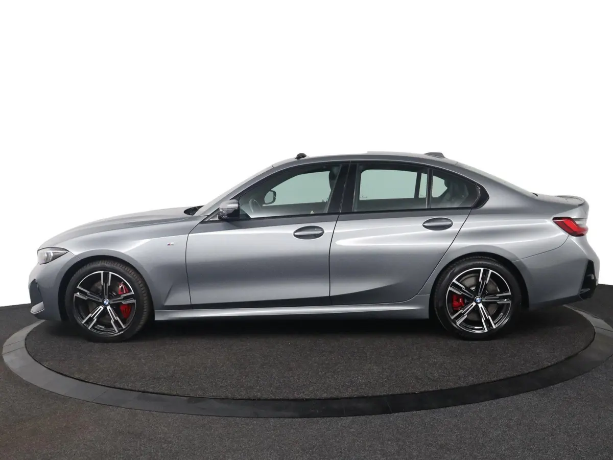 318i | M Sport Pro | Elektrisch Glazen Schuif-/kanteldak | Carbon interieur | HiFi Systeem | Parkeersensoren voor en achter | Adaptive LED Koplampen |