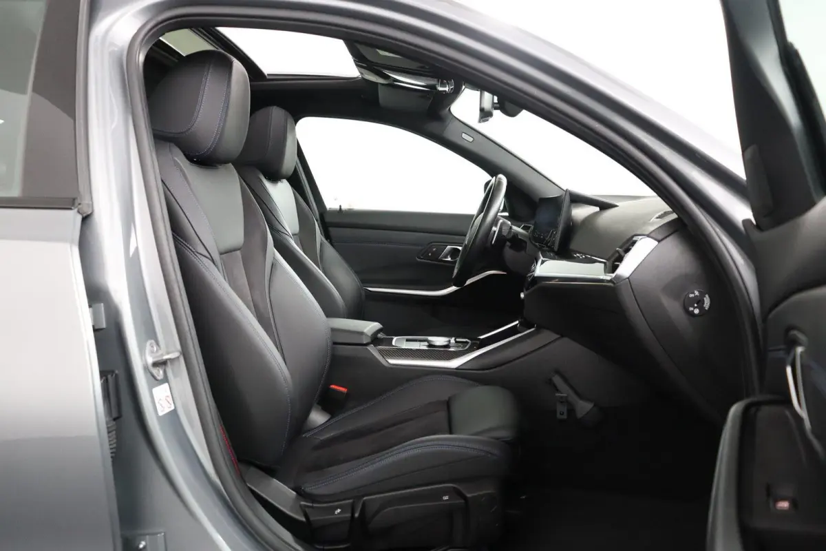 318i | M Sport Pro | Elektrisch Glazen Schuif-/kanteldak | Carbon interieur | HiFi Systeem | Parkeersensoren voor en achter | Adaptive LED Koplampen |