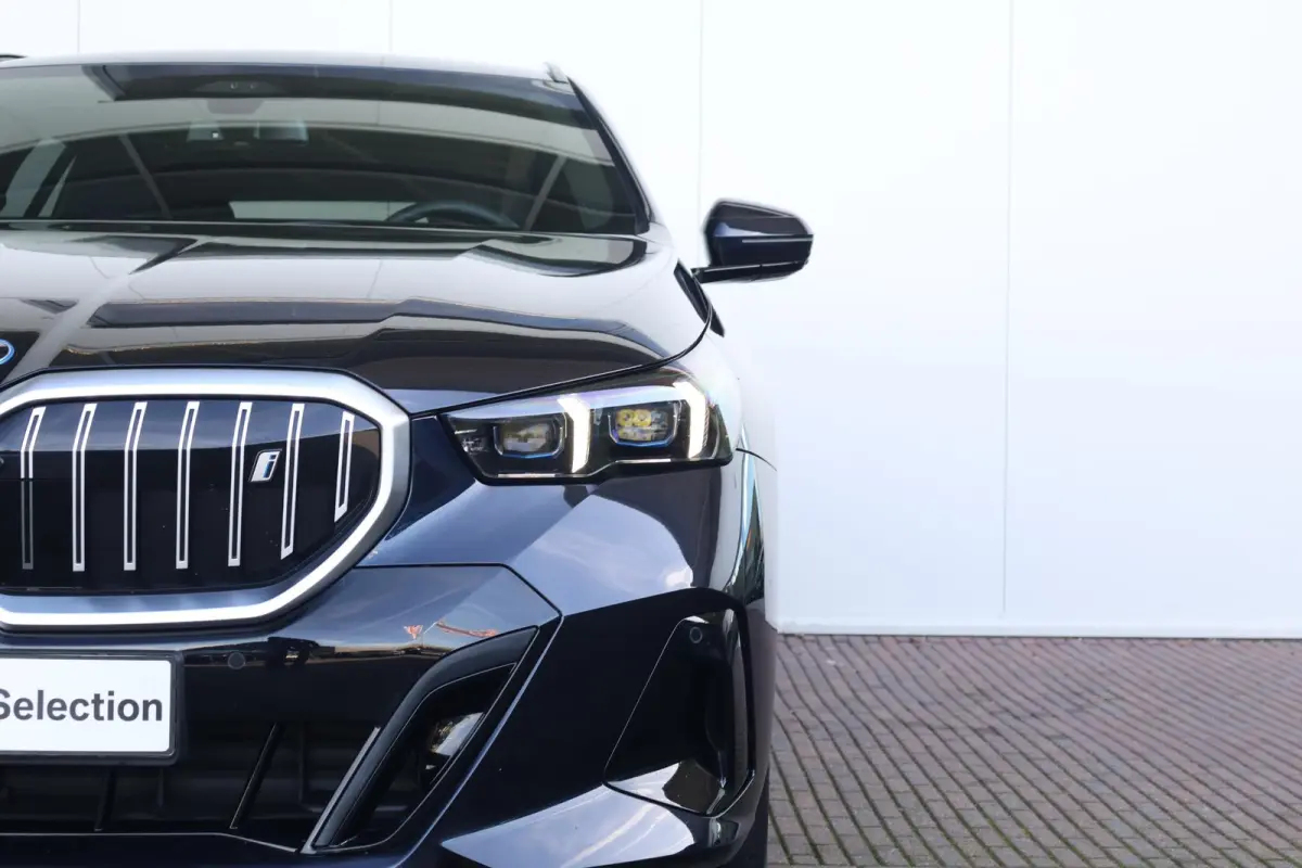 eDrive40 M Sport Edition 84 kWh | SoH 99% | M-Sport Pakket | Trekhaak | Leder | Elektr. Stoelen | Stoelverwarming | Head-Up | Harman Kardon | Active Cruise |