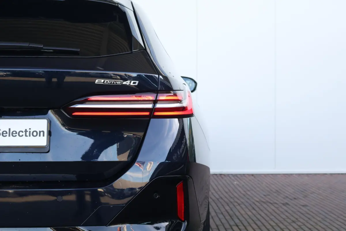 eDrive40 M Sport Edition 84 kWh | SoH 99% | M-Sport Pakket | Trekhaak | Leder | Elektr. Stoelen | Stoelverwarming | Head-Up | Harman Kardon | Active Cruise |