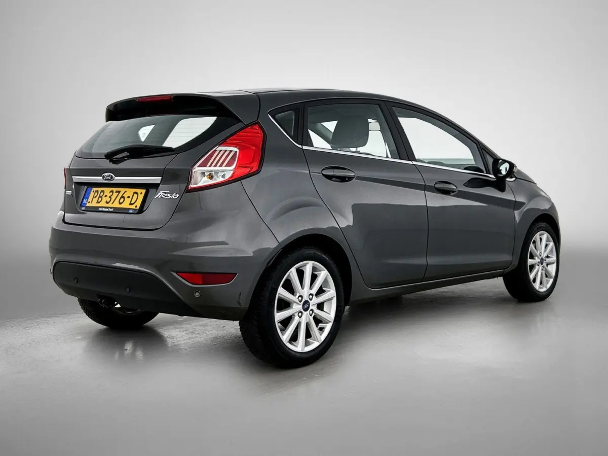 1.0 EcoBoost Titanium | WORDT VERWACHT | CLIMATE CONTROL | PARKEERSENSOREN | MULTIFUNCTIONEEL STUURWIEL |