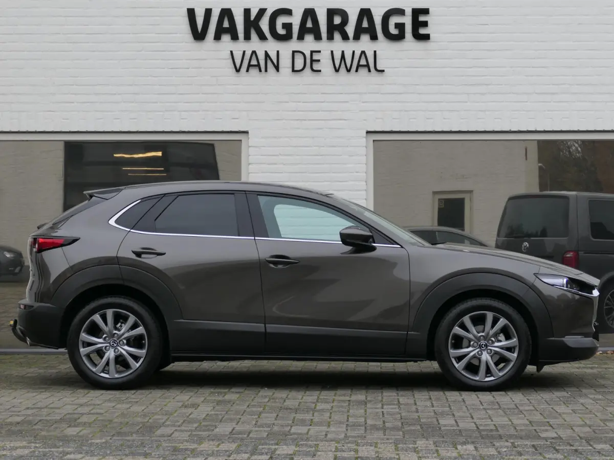 2.0 e-SkyActiv-X M Hybrid Sportive | Trekhaak | BOSE | ACC | Head-up | Elektrische achterklep | Apple-/Android Carplay | Dodehoek detectie | Stuur-/Stoelverwarming | Achteruitrijcamera