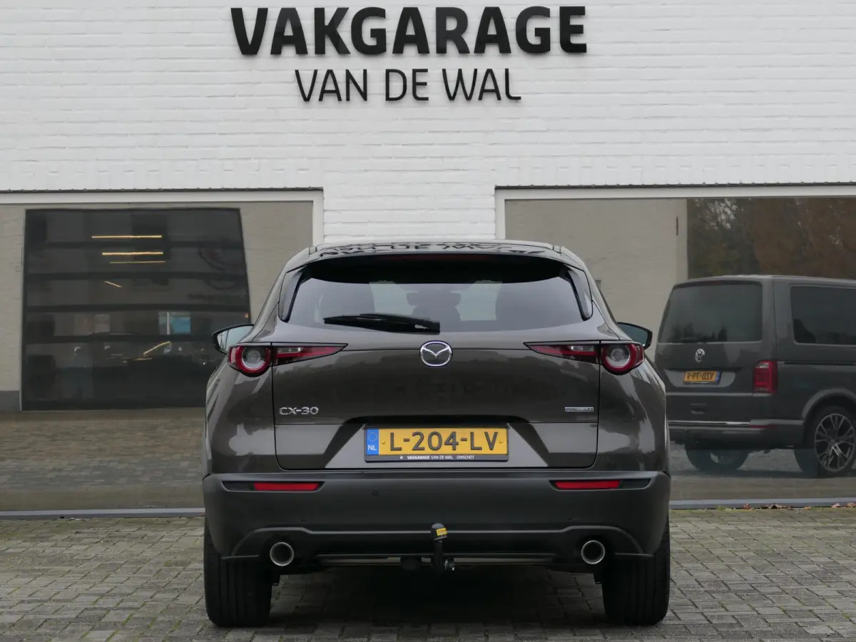 2.0 e-SkyActiv-X M Hybrid Sportive | Trekhaak | BOSE | ACC | Head-up | Elektrische achterklep | Apple-/Android Carplay | Dodehoek detectie | Stuur-/Stoelverwarming | Achteruitrijcamera