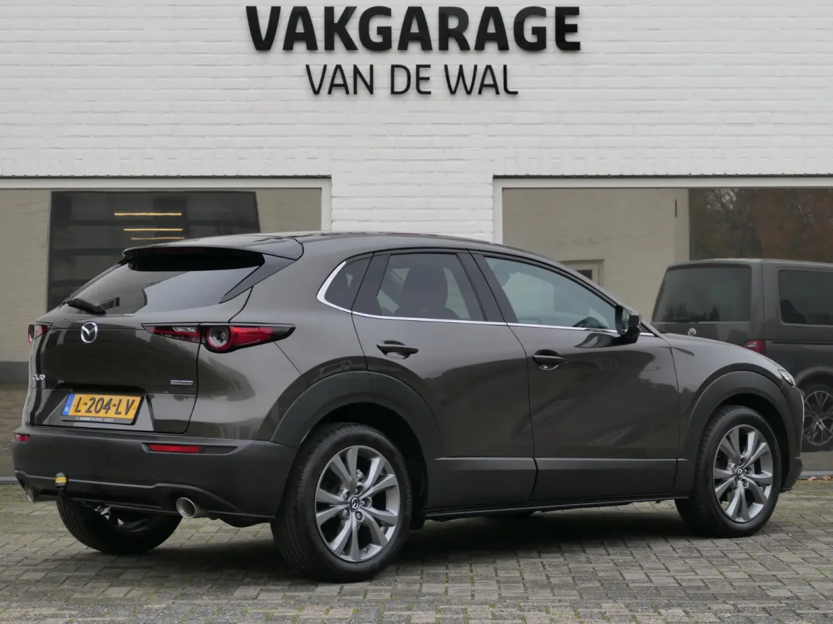 2.0 e-SkyActiv-X M Hybrid Sportive | Trekhaak | BOSE | ACC | Head-up | Elektrische achterklep | Apple-/Android Carplay | Dodehoek detectie | Stuur-/Stoelverwarming | Achteruitrijcamera