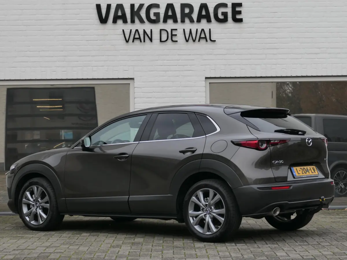 2.0 e-SkyActiv-X M Hybrid Sportive | Trekhaak | BOSE | ACC | Head-up | Elektrische achterklep | Apple-/Android Carplay | Dodehoek detectie | Stuur-/Stoelverwarming | Achteruitrijcamera
