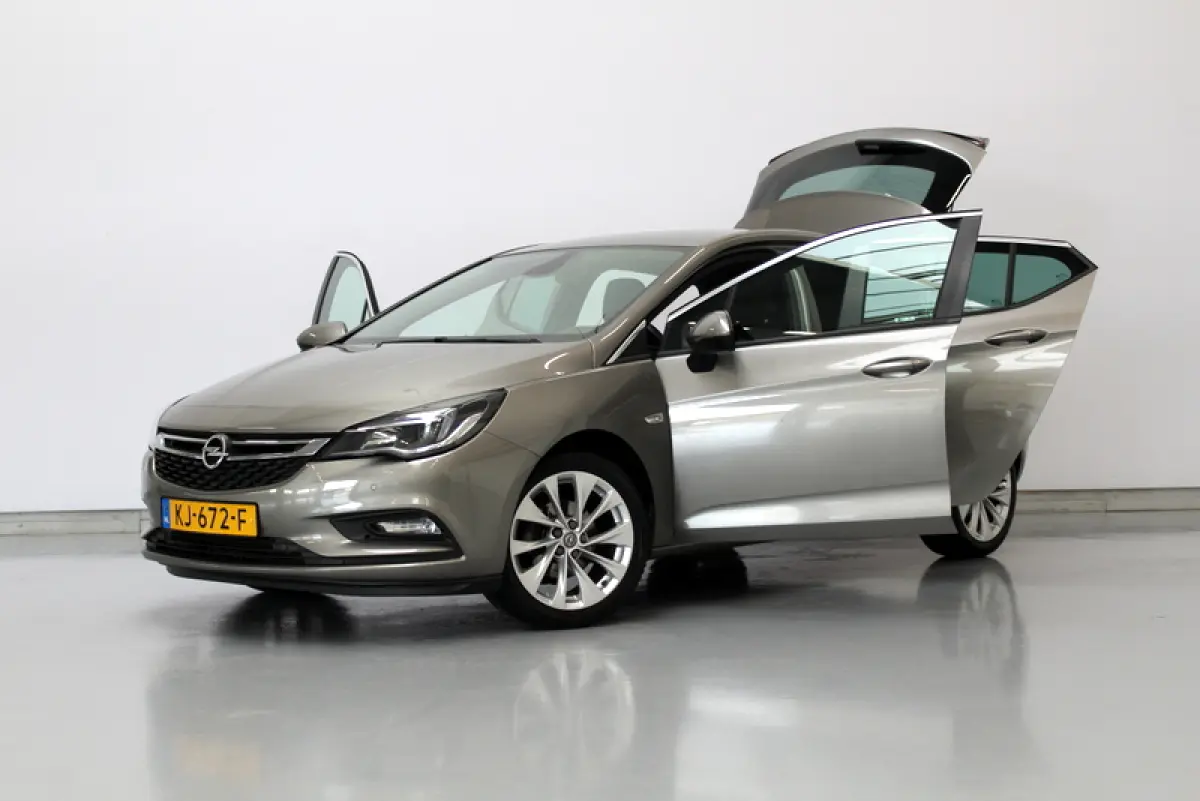 1.0 Business+ 105PK, RIJKLAAR | CAMERA | AFNEEMBARE TREKHAAK | AIRCO | CARPLAY
