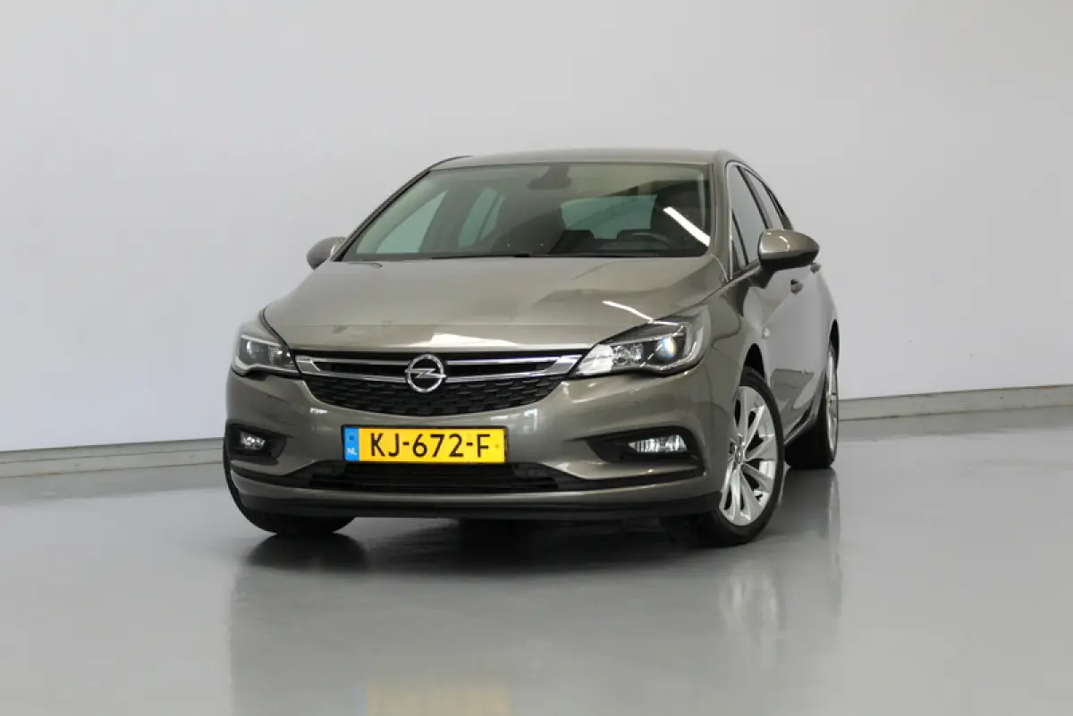 1.0 Business+ 105PK, RIJKLAAR | CAMERA | AFNEEMBARE TREKHAAK | AIRCO | CARPLAY