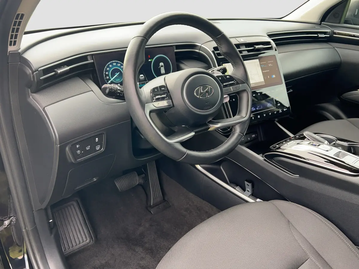 1.6 T-GDI HEV 230pk Comfort Smart | Camera | Climate controle | Elektrische achterklep | Premium Audio | Carplay | Adaptive cruise controle | Stoelverwarming | Stoelverwarming