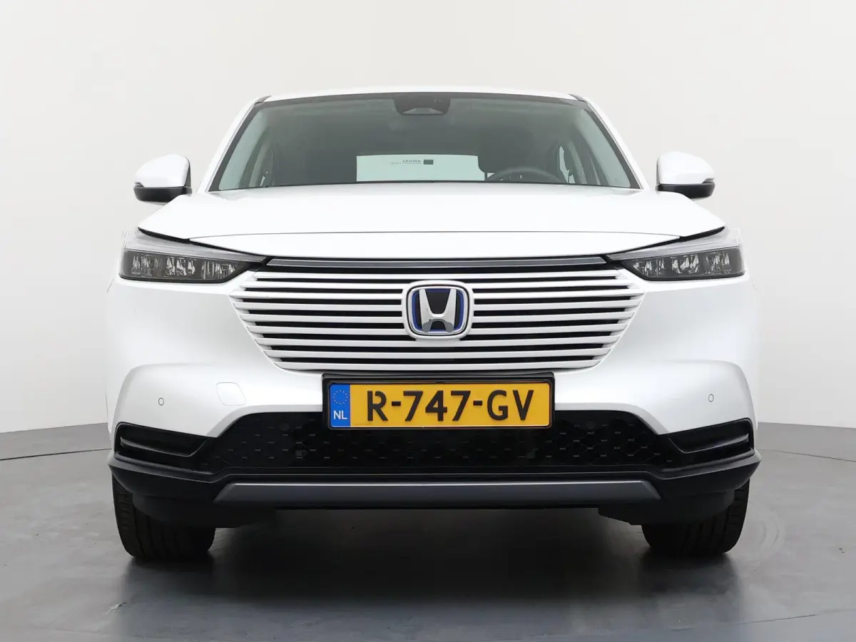 1.5 e:HEV Elegance | Adaptieve Cruise | Camera | Stoelverwarming | Navi |