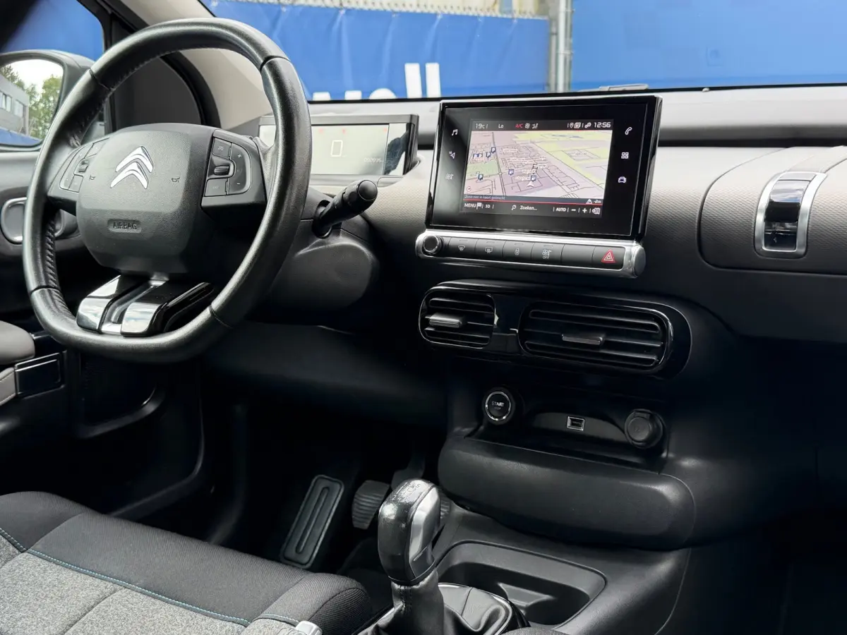 1.2 PureTech Shine|2e Eigenaar|AfnmTrekhaak|D-Riem vv in 2023|CarPlay|Climate|Cruise|Navi|Camera|PDC V+A|N.A.P|