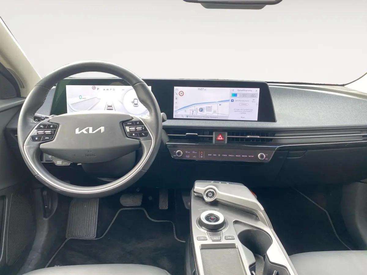 Air 58 kWh | Climate control | Navigatie | Parkeercamera | LM-velgen 19 inch | Adaptive cruise control | Line-assist | Dodehoek detectie |