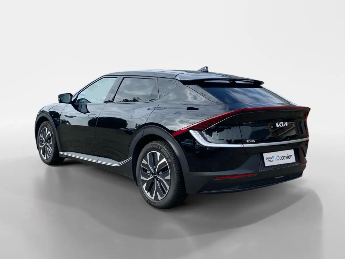 Air 58 kWh | Climate control | Navigatie | Parkeercamera | LM-velgen 19 inch | Adaptive cruise control | Line-assist | Dodehoek detectie |