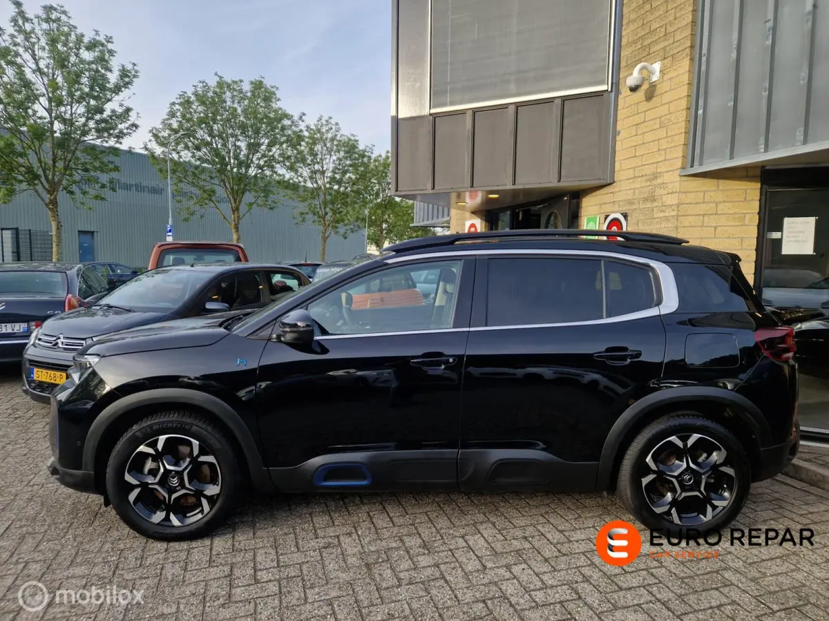 1.6 Plug-in Hybrid 225 Shine schuifdak
