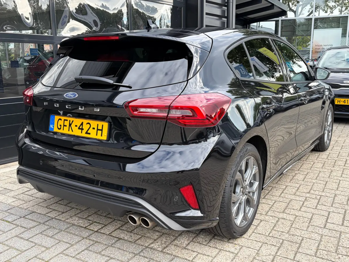1.0 Hybrid 125 PK ST Line | STUUR, STOEL EN VOORRUITVERWARMING| FULL LED| NAVIGATIE + APPLE CARPLAY/ANDROID AUTO| PARKEERSENSOREN V+A| KEYLESS START| NEDERLANDSE AUTO| EERSTE EIGENAAR| DEALE
