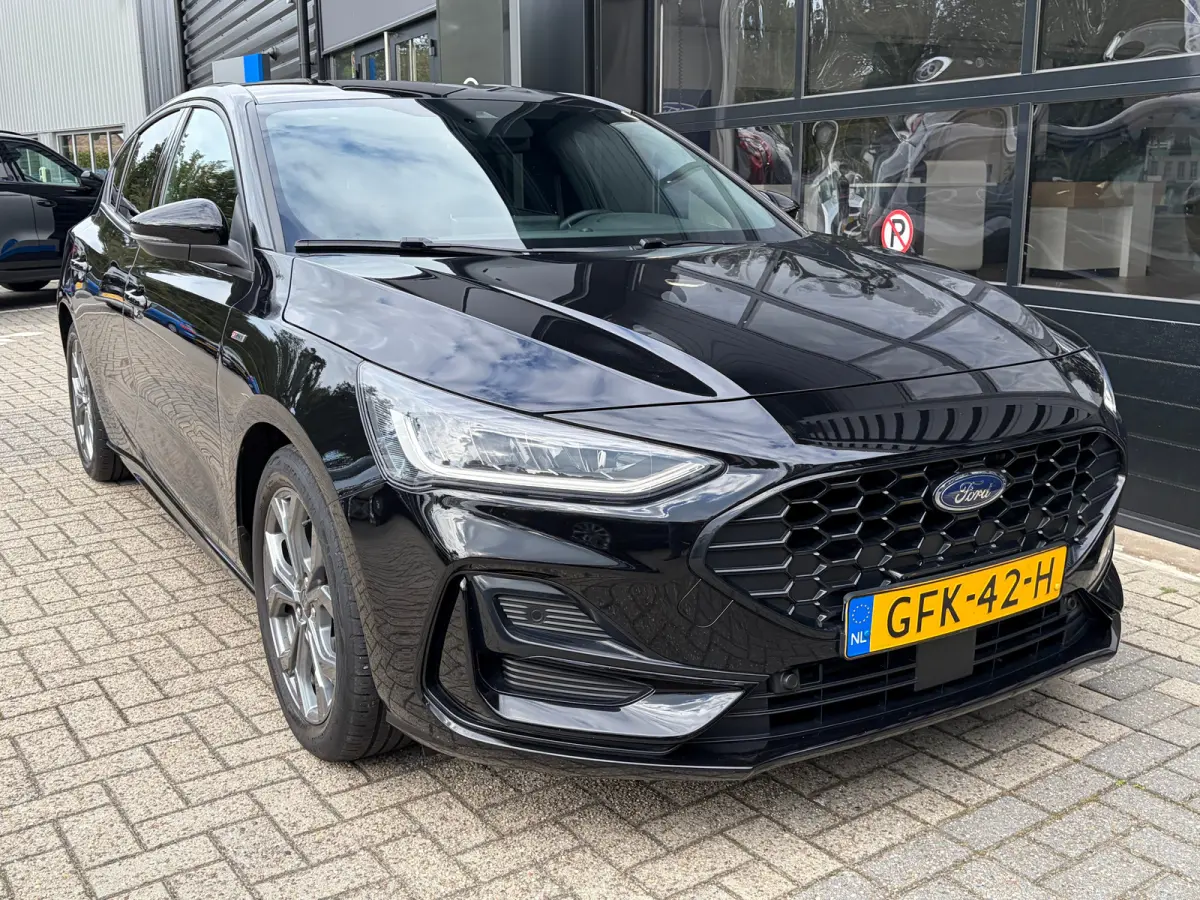 1.0 Hybrid 125 PK ST Line | STUUR, STOEL EN VOORRUITVERWARMING| FULL LED| NAVIGATIE + APPLE CARPLAY/ANDROID AUTO| PARKEERSENSOREN V+A| KEYLESS START| NEDERLANDSE AUTO| EERSTE EIGENAAR| DEALE