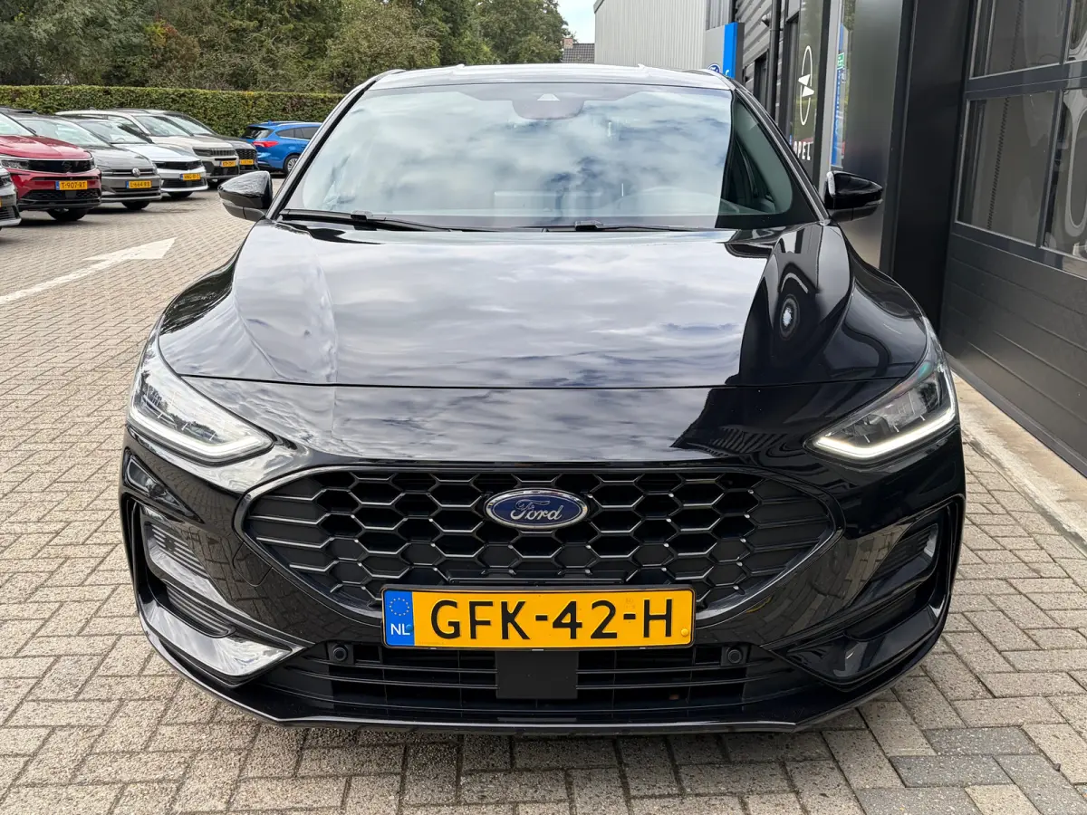 1.0 Hybrid 125 PK ST Line | STUUR, STOEL EN VOORRUITVERWARMING| FULL LED| NAVIGATIE + APPLE CARPLAY/ANDROID AUTO| PARKEERSENSOREN V+A| KEYLESS START| NEDERLANDSE AUTO| EERSTE EIGENAAR| DEALE