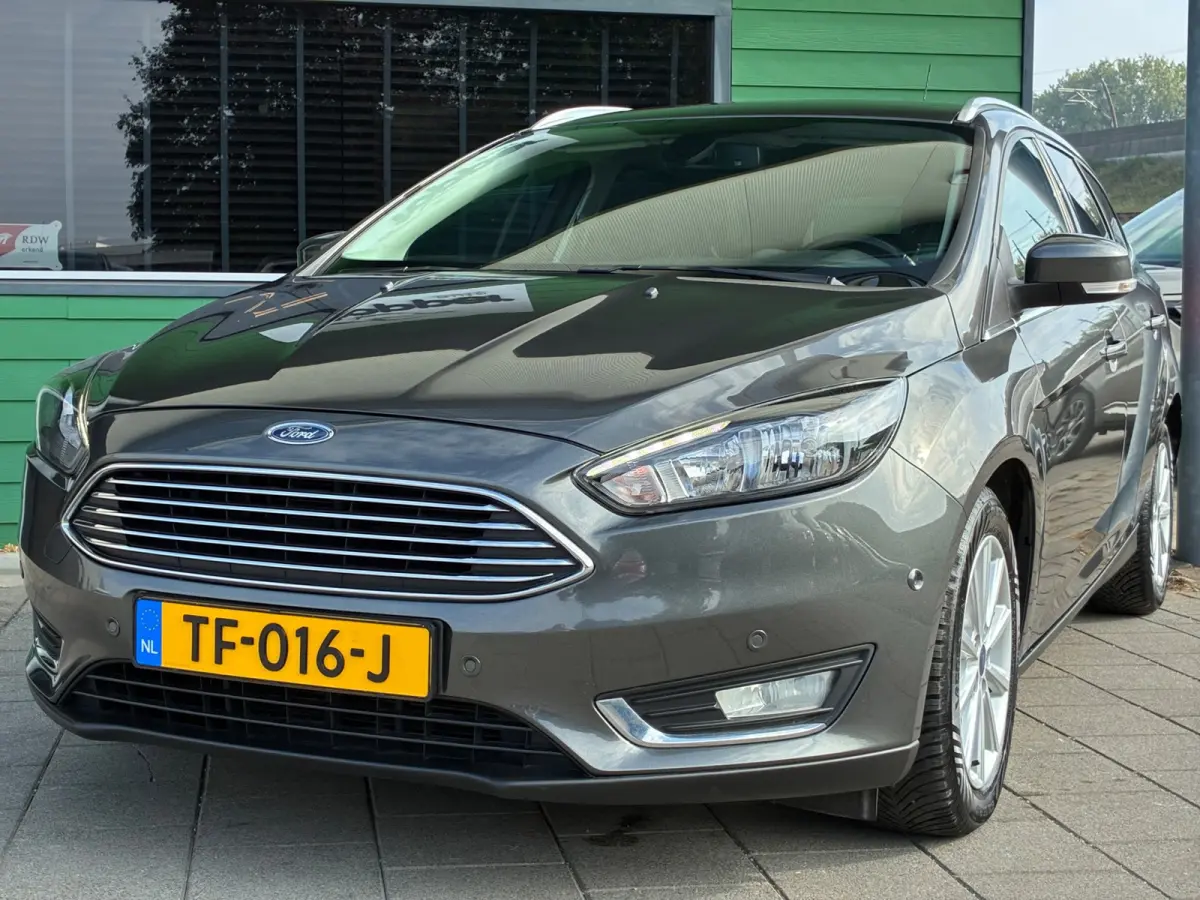 1.0 Titanium|Automaat|D-riem v.v.|Navigatie|Climatronic|CruiseControl|PDC|Trekhaak|