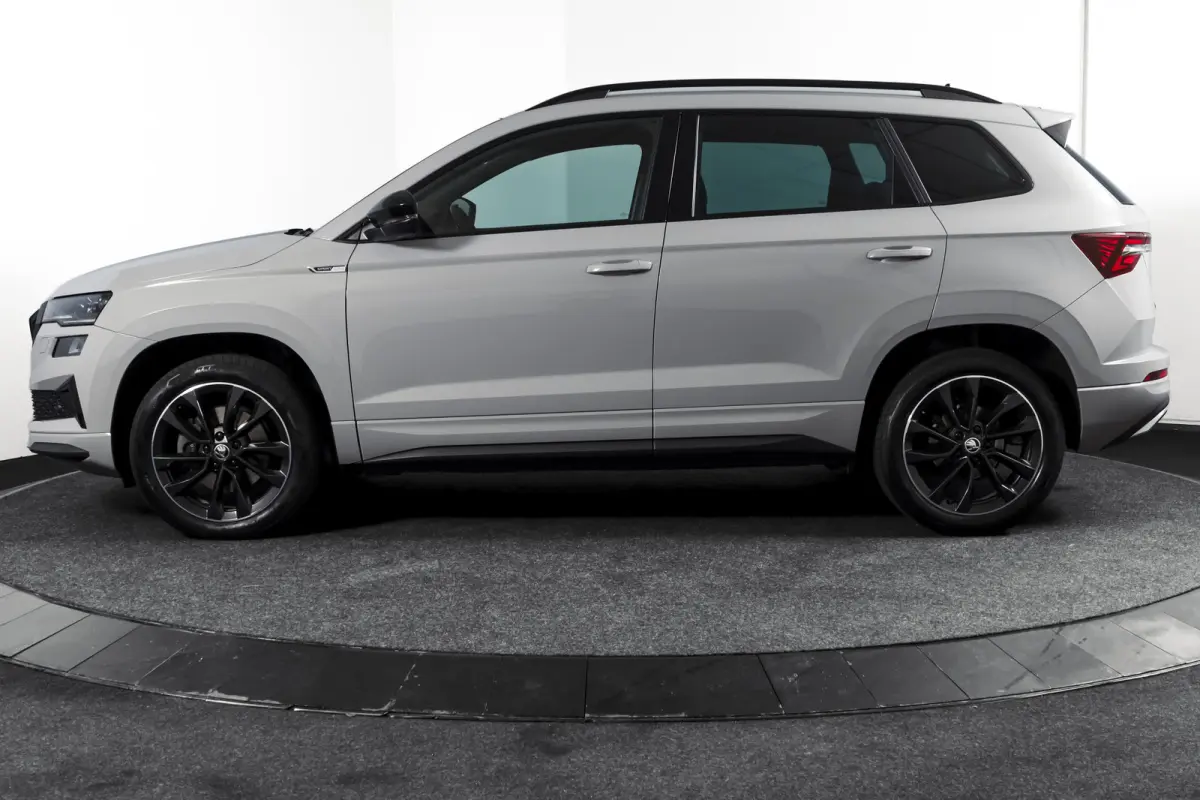 1.5 TSI ACT 150 PK Sportline Business | Afn. Trekhaak | Dig. Cockpit | Adapt. Cruise | Stoel-+Stuurverw. | Matrix LED | Camera | NAV+App. Connect | ECC | Elek. Klep | LM 18" |
