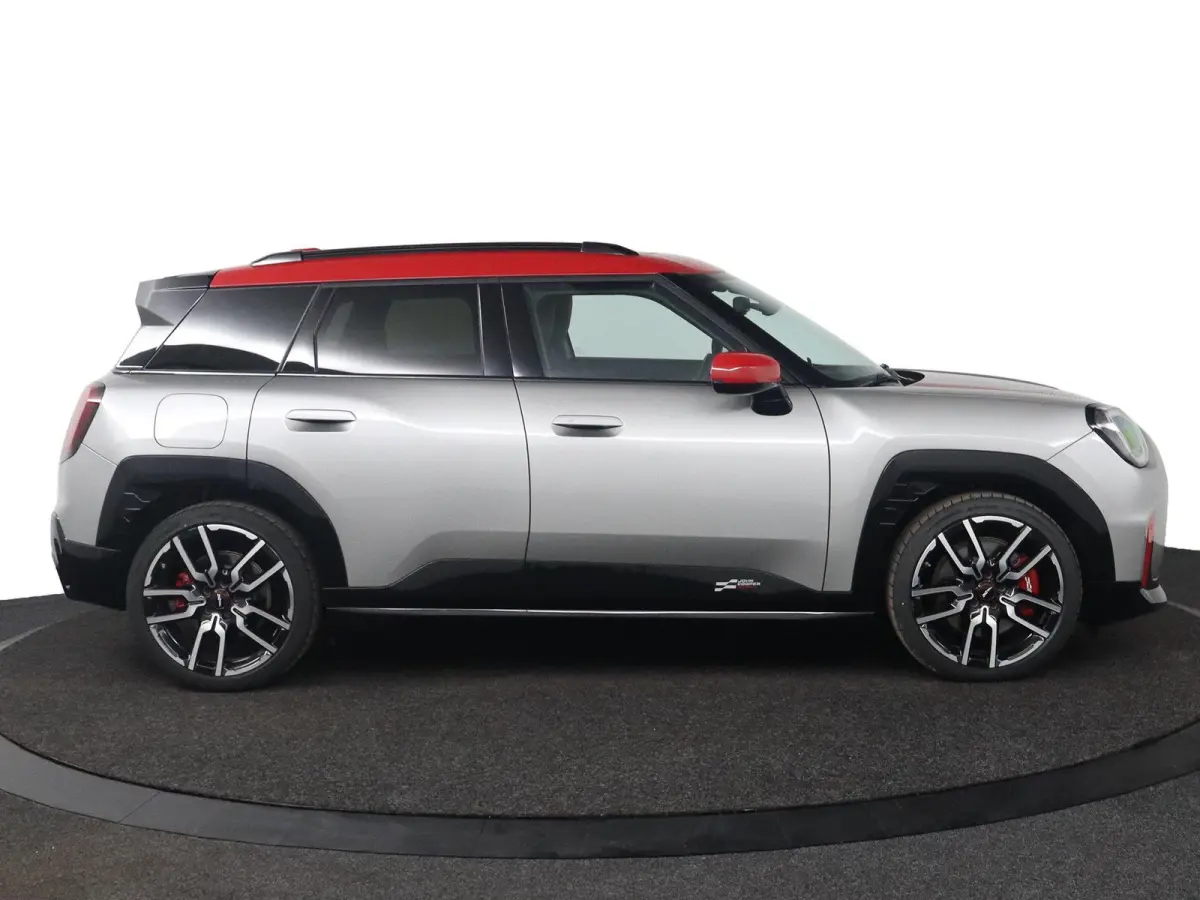E JCW | SOH 100% | JCW Uitvoering | Pakket M | Stuurwielrandverwarming | Panoramadak | Head-Up Display | Harman Kardon