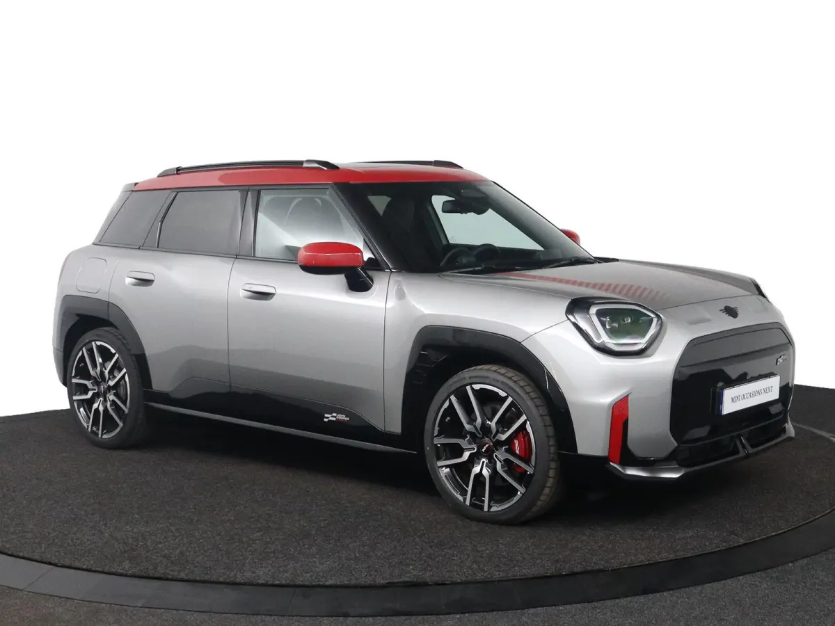 E JCW | SOH 100% | JCW Uitvoering | Pakket M | Stuurwielrandverwarming | Panoramadak | Head-Up Display | Harman Kardon