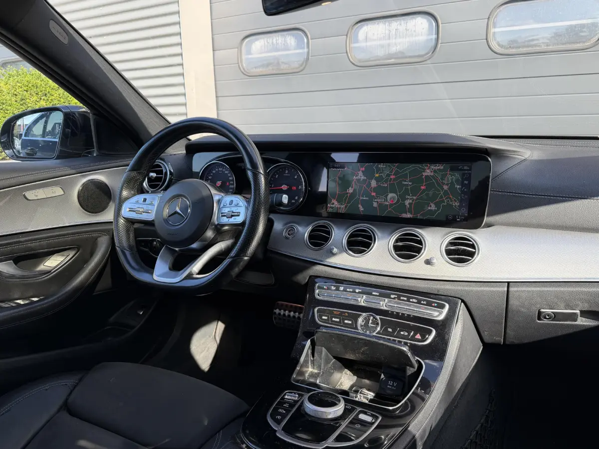 220 d AMG | Panoramadak | Camera | Sfeerverlichting | Navigatie | Stoelverwarming |