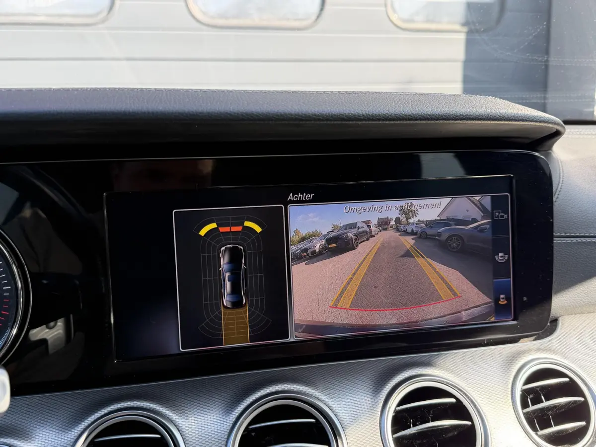220 d AMG | Panoramadak | Camera | Sfeerverlichting | Navigatie | Stoelverwarming |