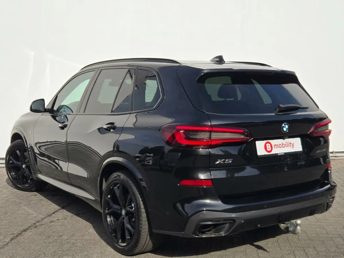 xDrive40i High Executive M-Sport Trekhaak 2700kg | Adaptive Cruise Control | Achteruitrijcamera | DAB | M-Sportremmen