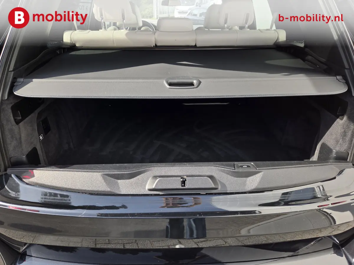 xDrive40i High Executive M-Sport Trekhaak 2700kg | Adaptive Cruise Control | Achteruitrijcamera | DAB | M-Sportremmen