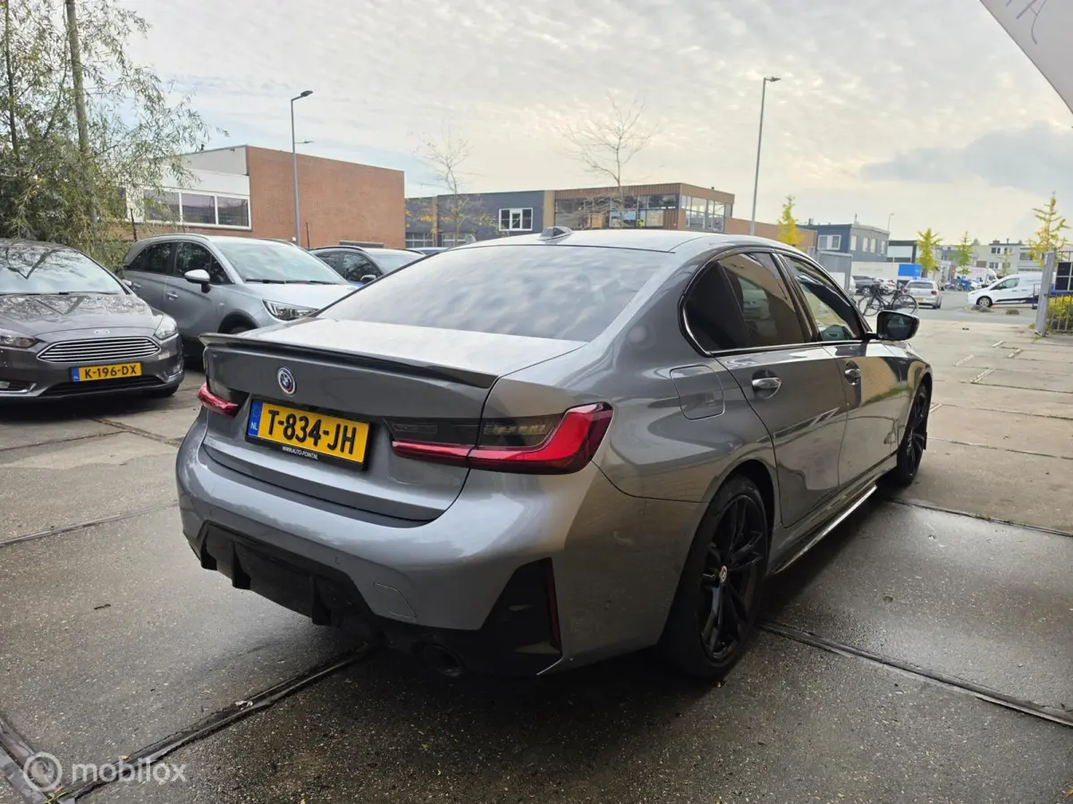 320e