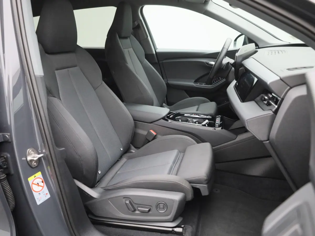 edition 83 kWh 252 PK | Adaptive cruise control | Navigatie | Stuurverwarming | Stoelverwarming voor & achter | Elektrisch instel. voorstoelen | 360 Camera | Smartphone interface | MMI-bijri