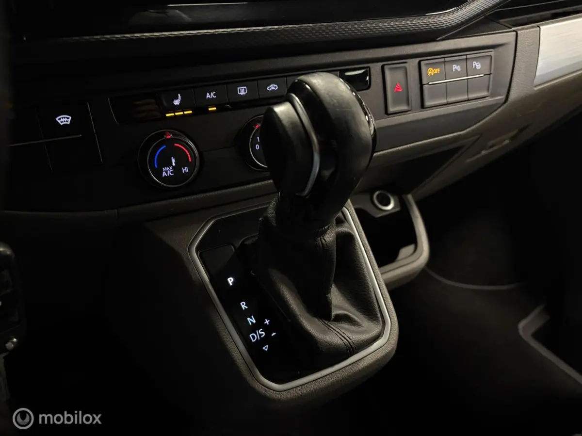 2.0 TDI L2H1 150 PK DUBBEL CABINE Highline BULLI 2x SCHUIFDEUR / AUTOMAAT / L2 / GESTOFFEERDE BAK / VIRTUAL DASH / LEDEREN INTERIEUR / 20'' LMV