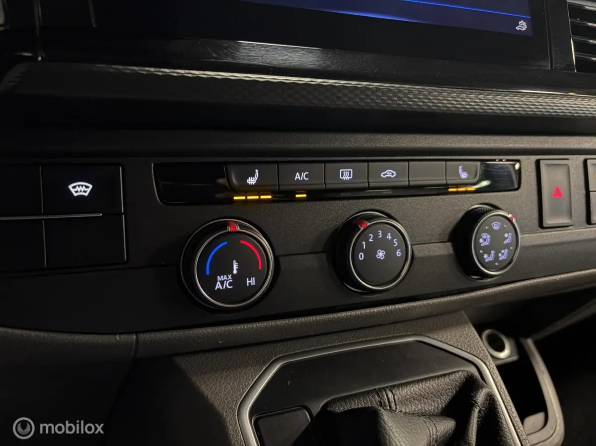 2.0 TDI L2H1 150 PK DUBBEL CABINE Highline BULLI 2x SCHUIFDEUR / AUTOMAAT / L2 / GESTOFFEERDE BAK / VIRTUAL DASH / LEDEREN INTERIEUR / 20'' LMV