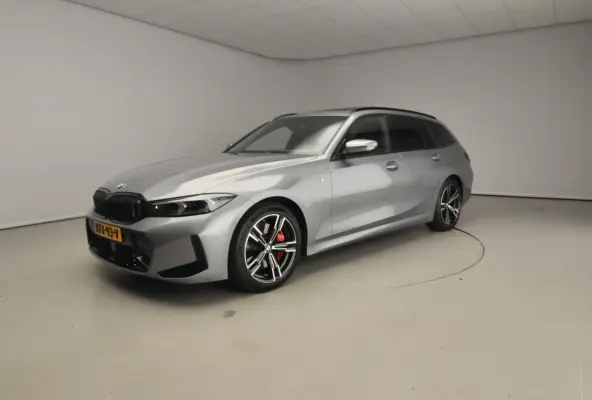318i | M-Sportpakket | LED | Leder | Navigatie | Trekhaak | Panoramadak | Stoelverwarming | DAB | Alu 18 inch