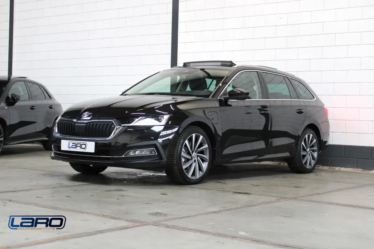 1.4 TSI iV PHEV Sportline Business | Pano Trekhaak Memory DCC Matrix ACC HuD Camera CarPlay