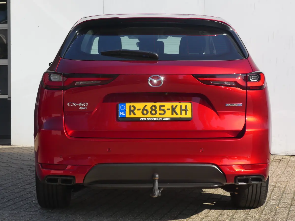 2.5 e-SkyActiv PHEV Homura | TREKHAAK | DODEHOEKDETECTIE | STOEL+STUURVERWARMING | CAMERA | PARKEERSENSOREN V+A | NAVI | LMV 20" | APPLE CARPLAY / ANDROID AUTO | HEAD-UP |